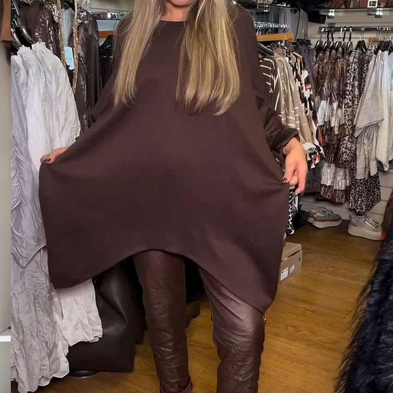 Kahetükkiline komplekt: vaba lõikega pluus ja ühevärvilised püksid